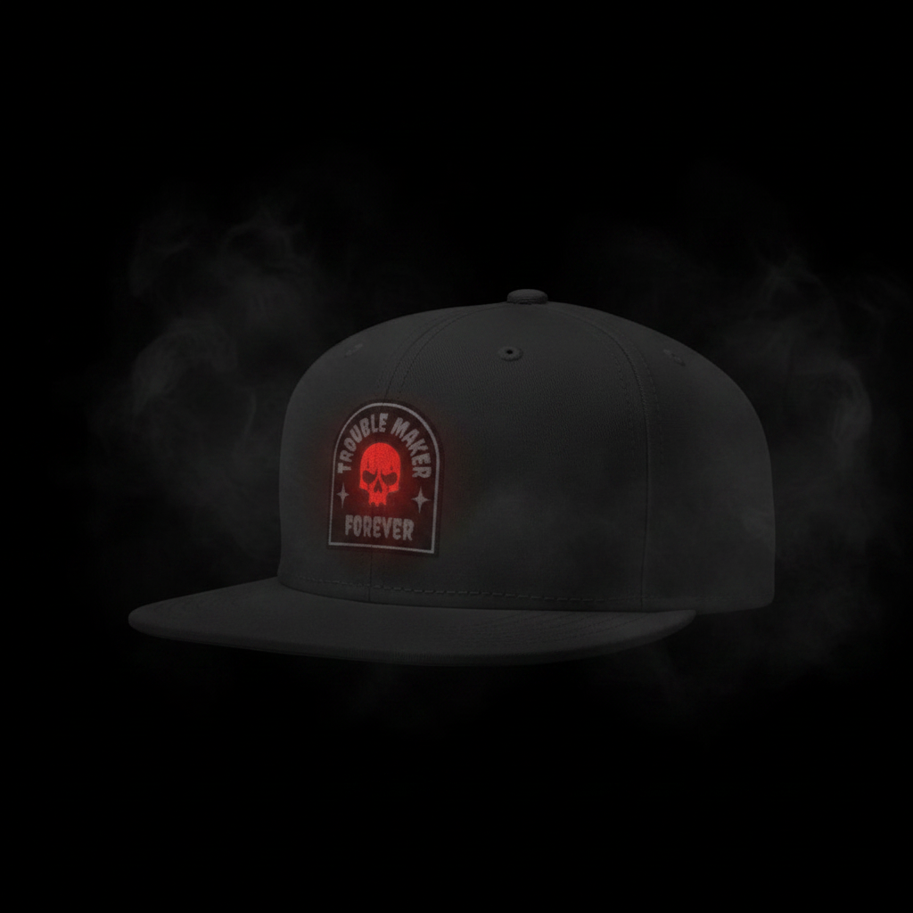 Goatkapda Trouble Maker snapback cap with front logo, adjustable strap, and classic flat brim, stylish for casual wear