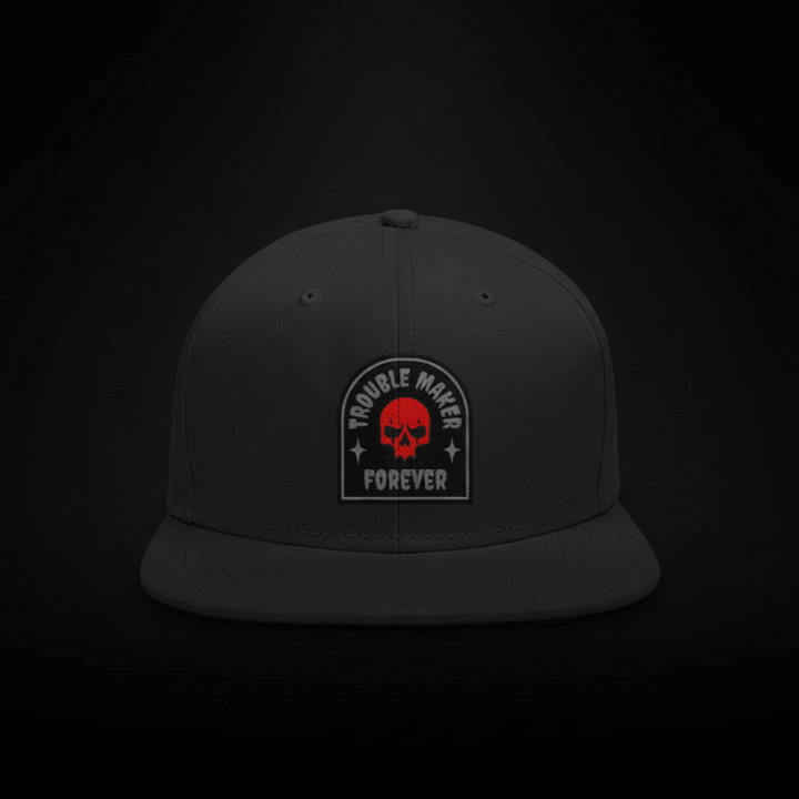 Goatkapda Trouble Maker snapback cap with bold front design, adjustable strap, and classic flat brim, stylish headwear for casual wear.