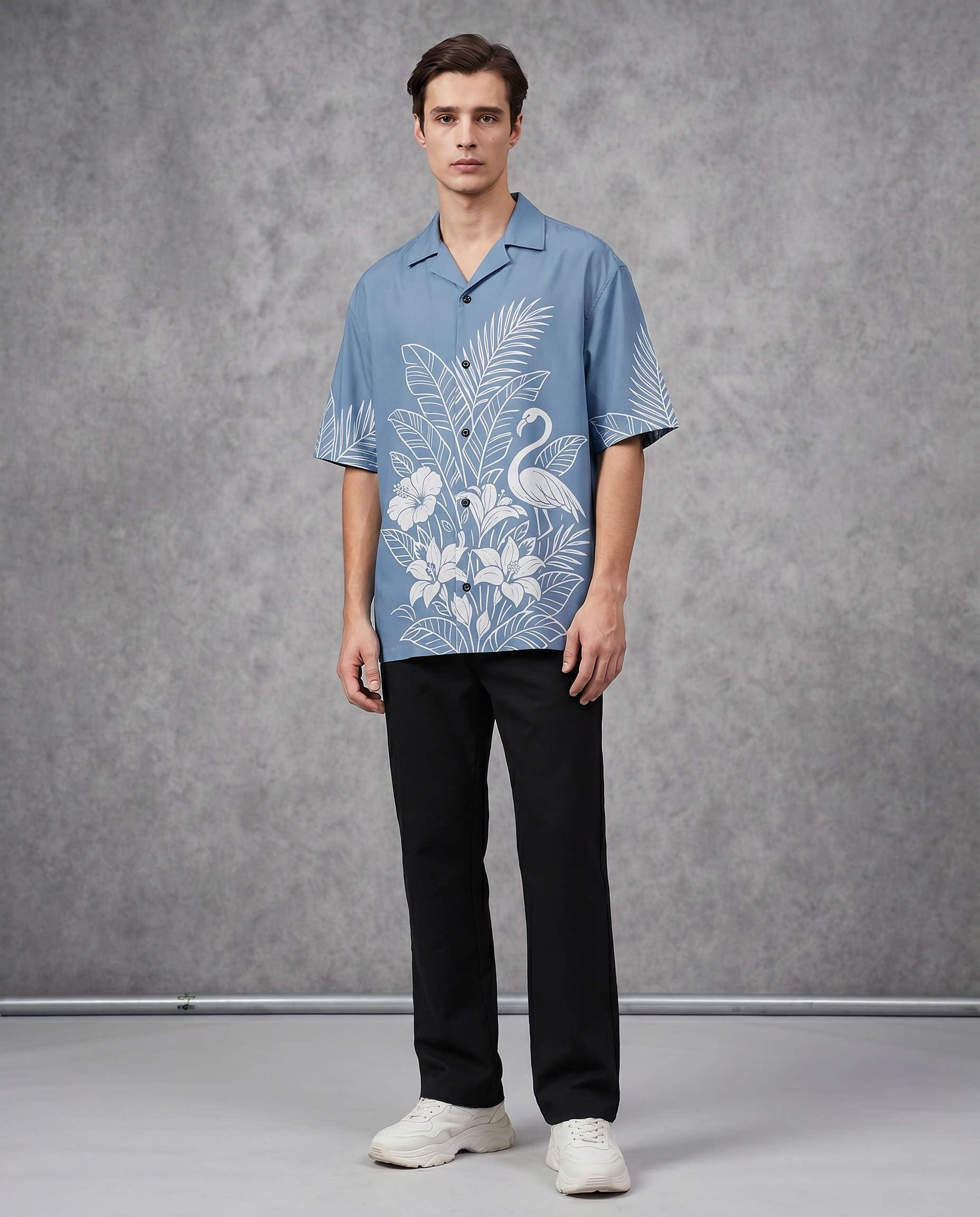 Sky blue tropical flamingo shirt by Goatkapda featuring a vibrant flamingo print on lightweight fabric.