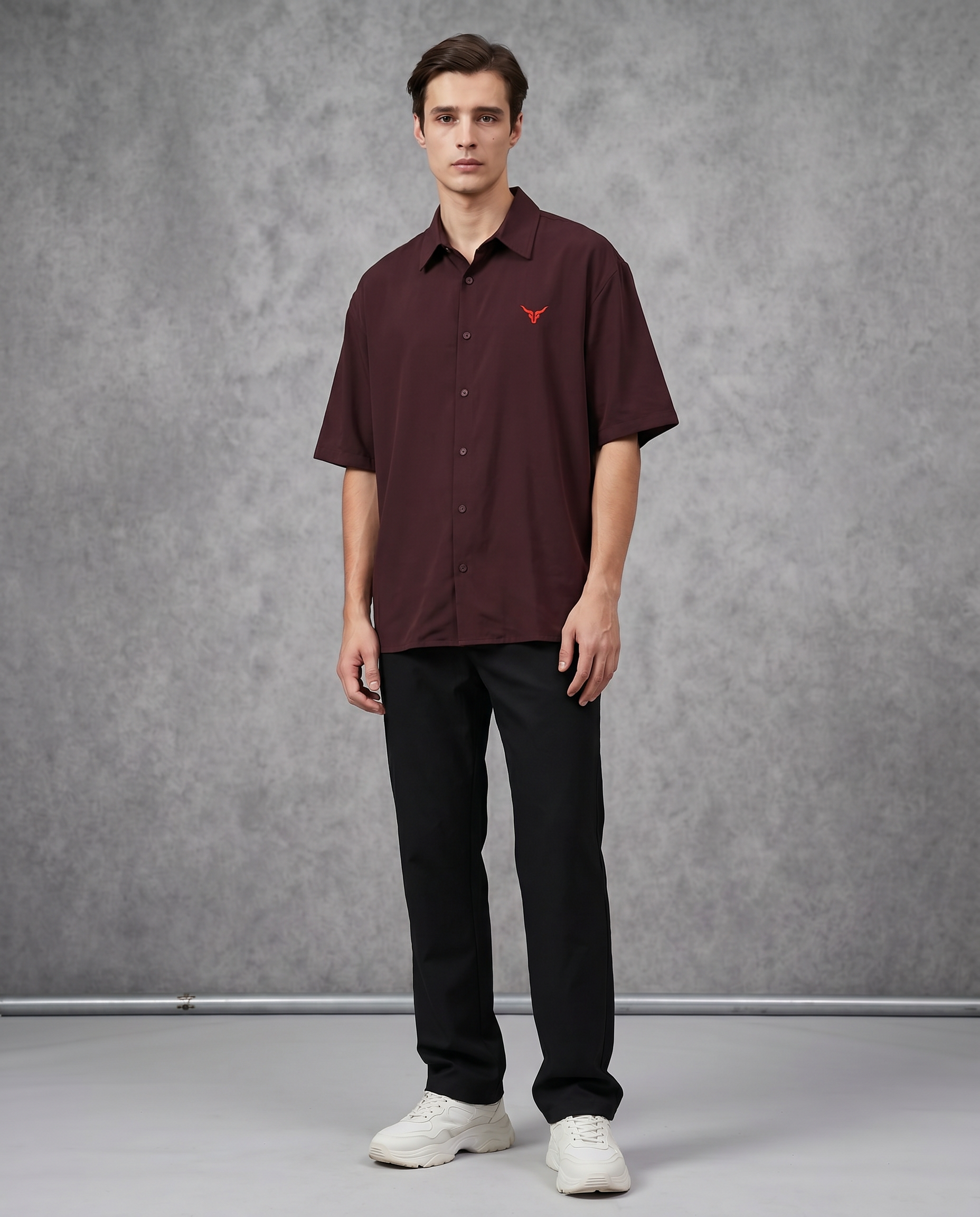 Maroon-colored casual dress from Goatkapda, featuring a comfortable fit and stylish design, displayed on a hanger.