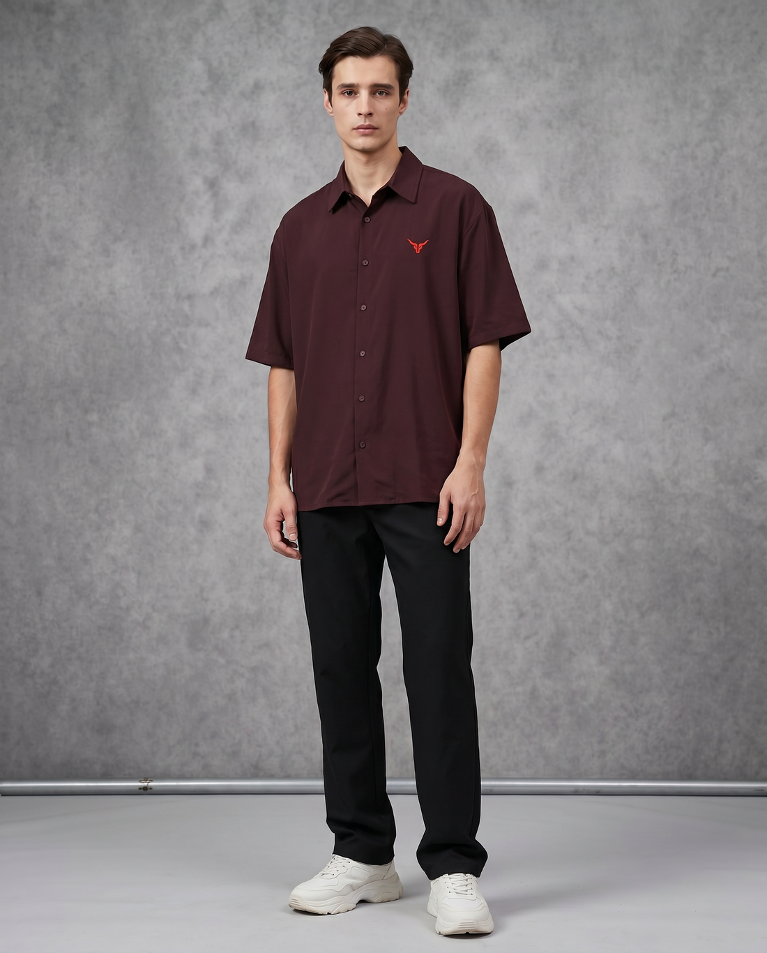Maroon-colored casual dress from Goatkapda, featuring a comfortable fit and stylish design, displayed on a hanger.
