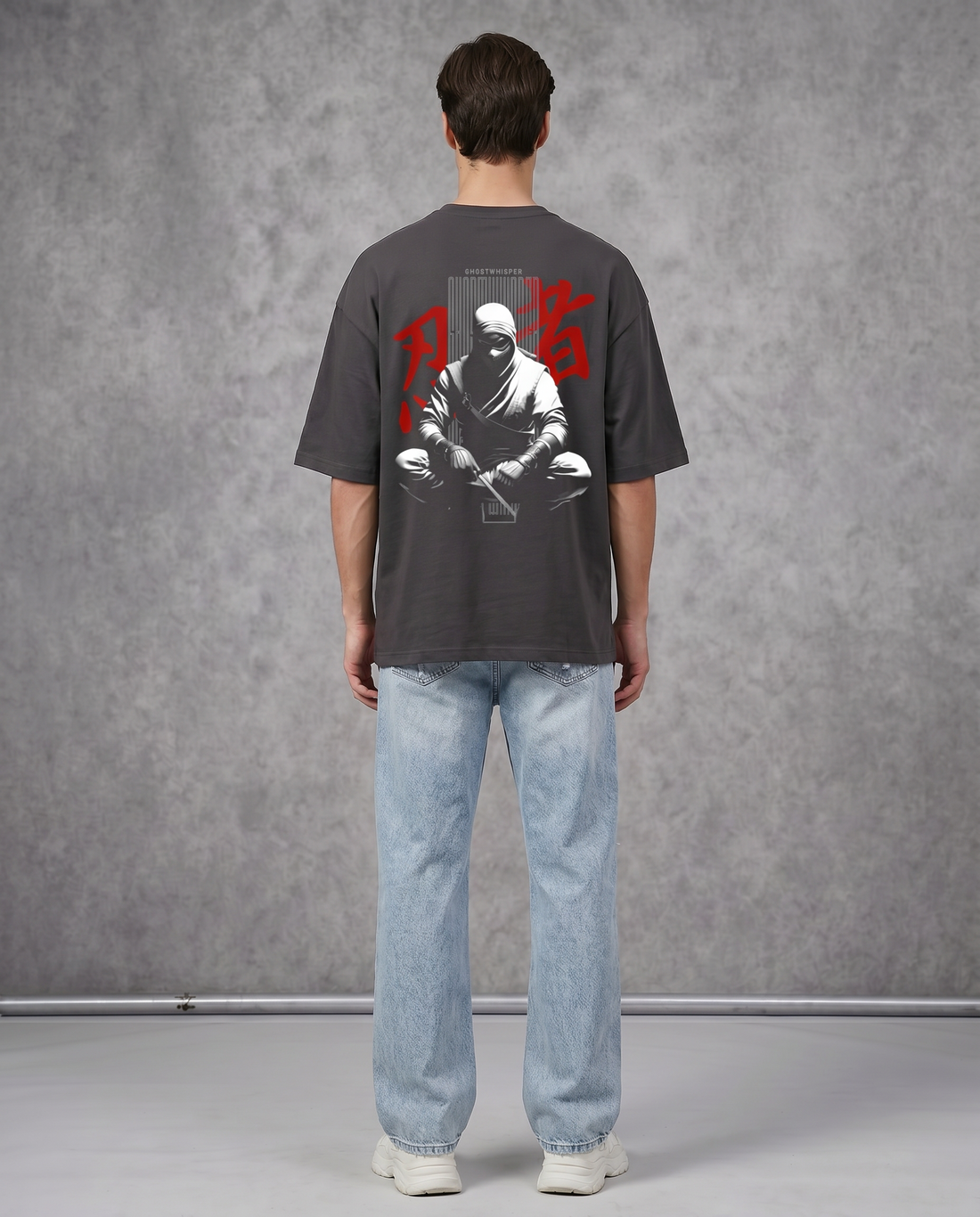 Goatkapda Ghost Whisper™ featuring a sleek, modern design with a dark ghostly figure on a reflective surface.