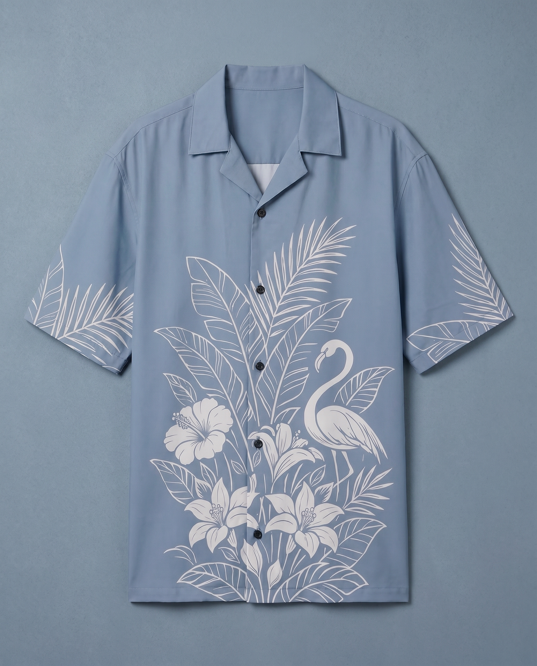 Sky blue tropical flamingo shirt by Goatkapda featuring a vibrant flamingo pattern on lightweight fabric.